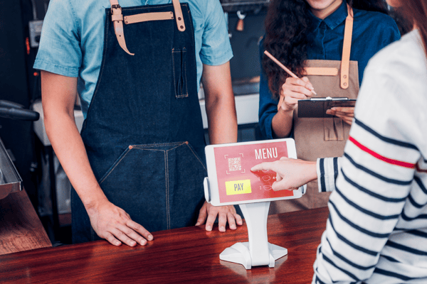 customer using qr ordering features at a resturant