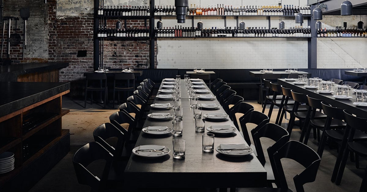 Long dining table set up and ready for service in Agnes restaurant Brisbane