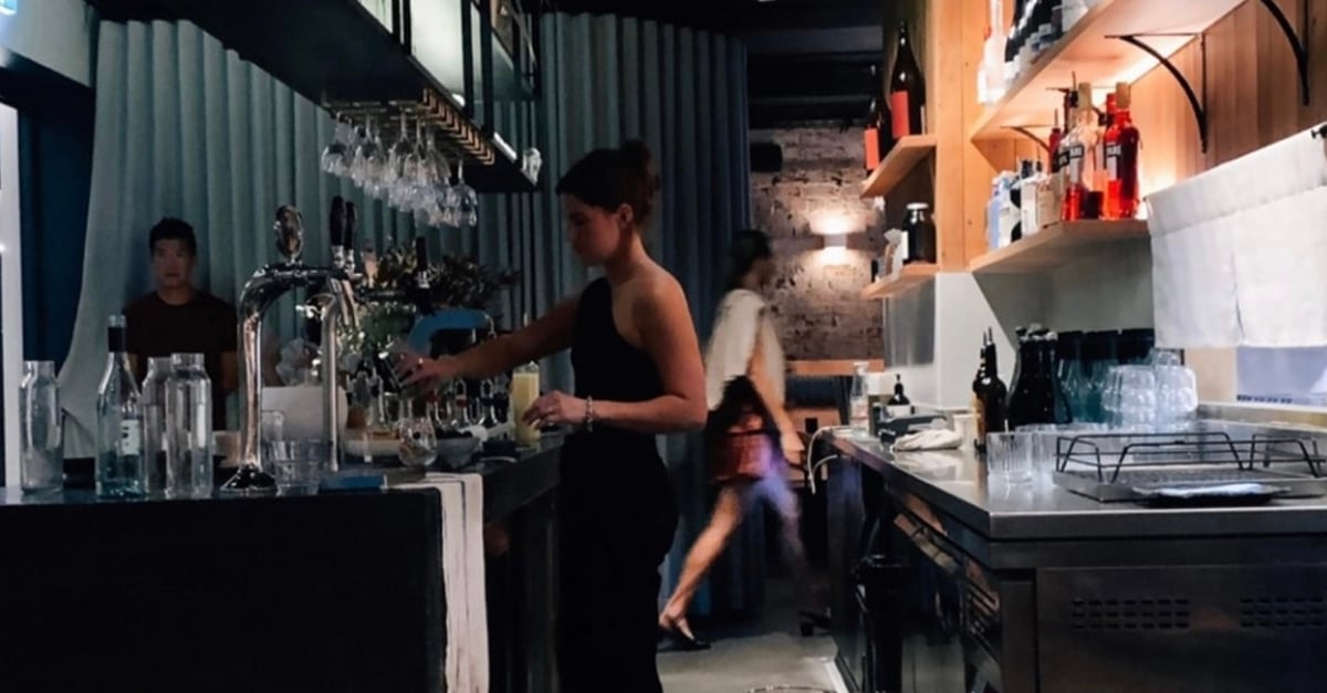 Bartender making a drink inside RND restaurant