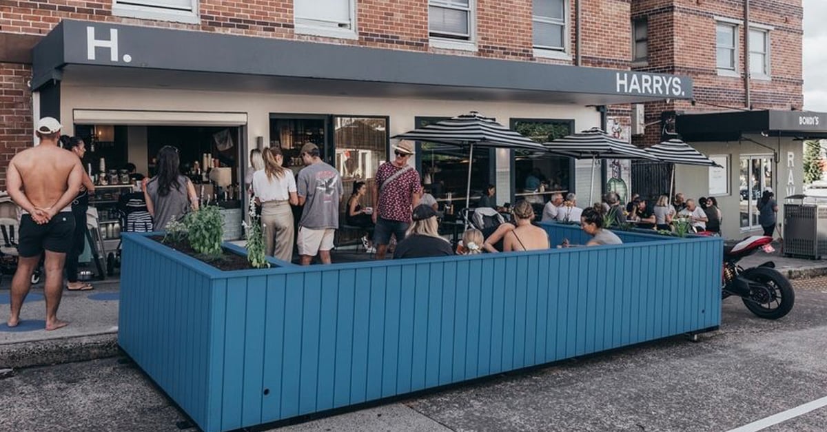 Harrys Cafe Bondi open with customers sitting outside