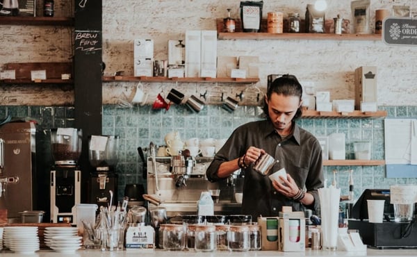 Barista in a cafe kitchen