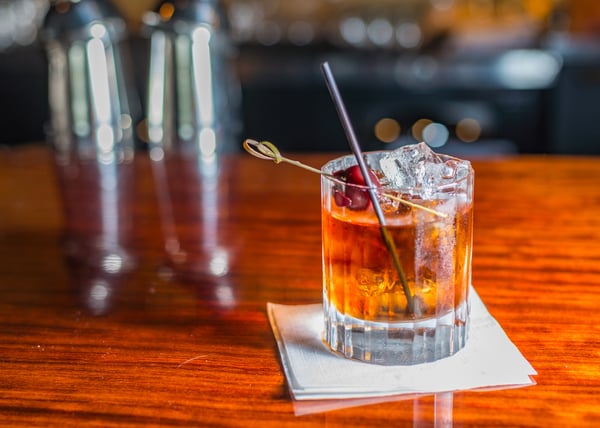 cocktail on a counter in a bar