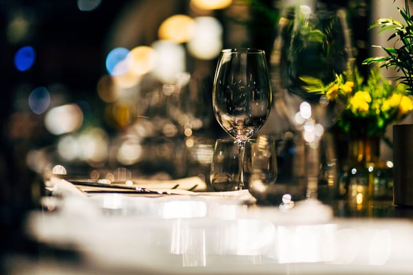 restaurant table with wine glass