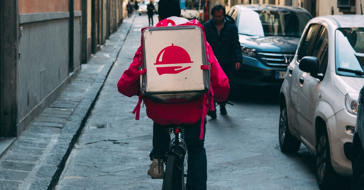 Online order delivery riding along the street