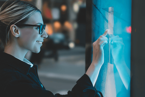 Women using a a Self-Ordering Kiosks