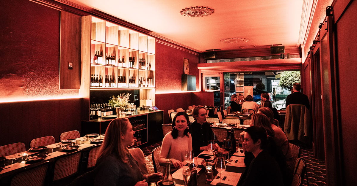 Group of diners enjoying a meal in Oydis restaurant