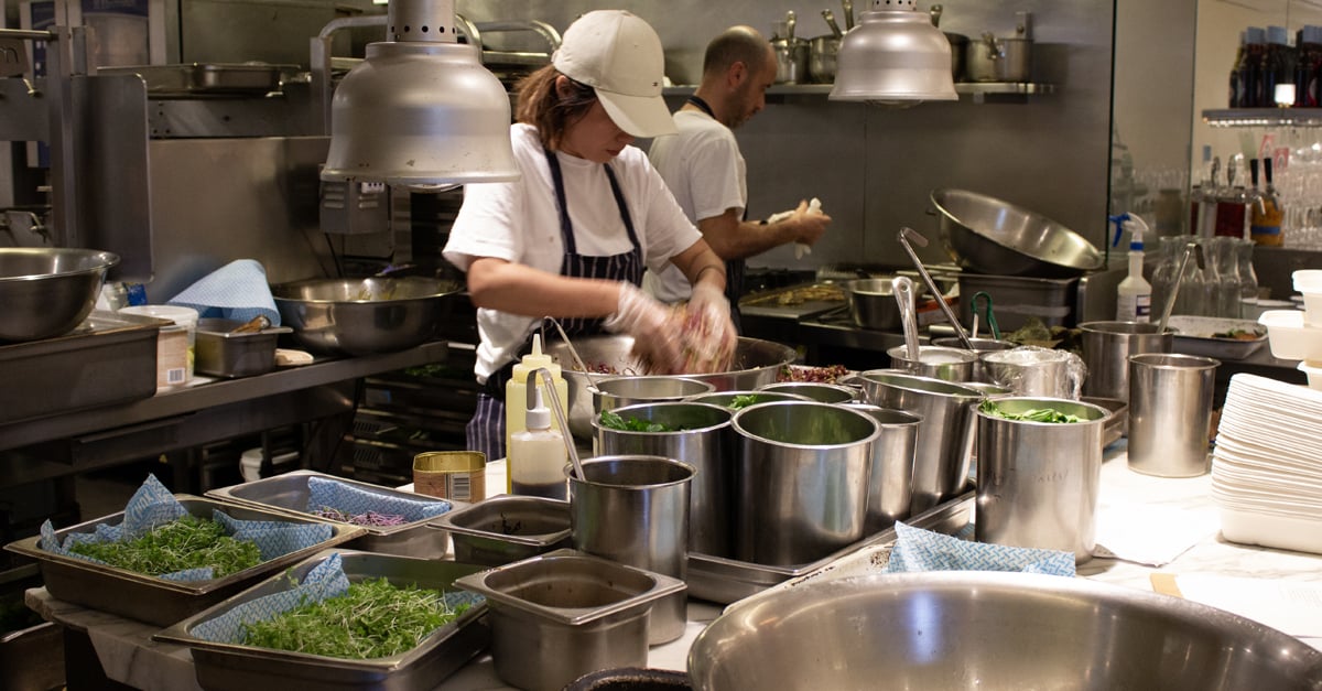 Chefs in the kitchen cooking