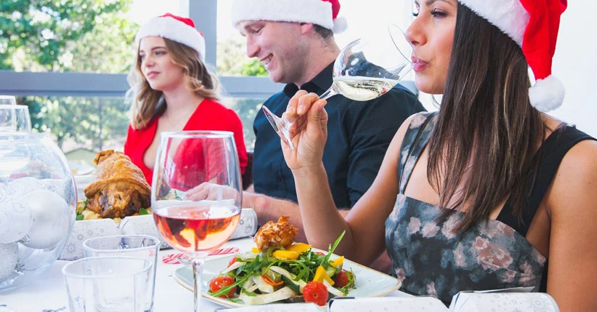 Guests enjoying Christmas lunch at a restaurant