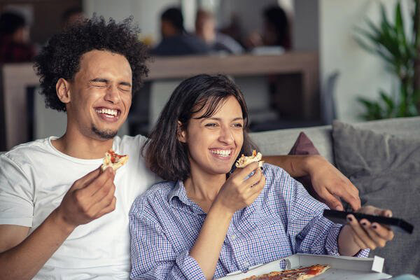 couple enjoying home delivered food