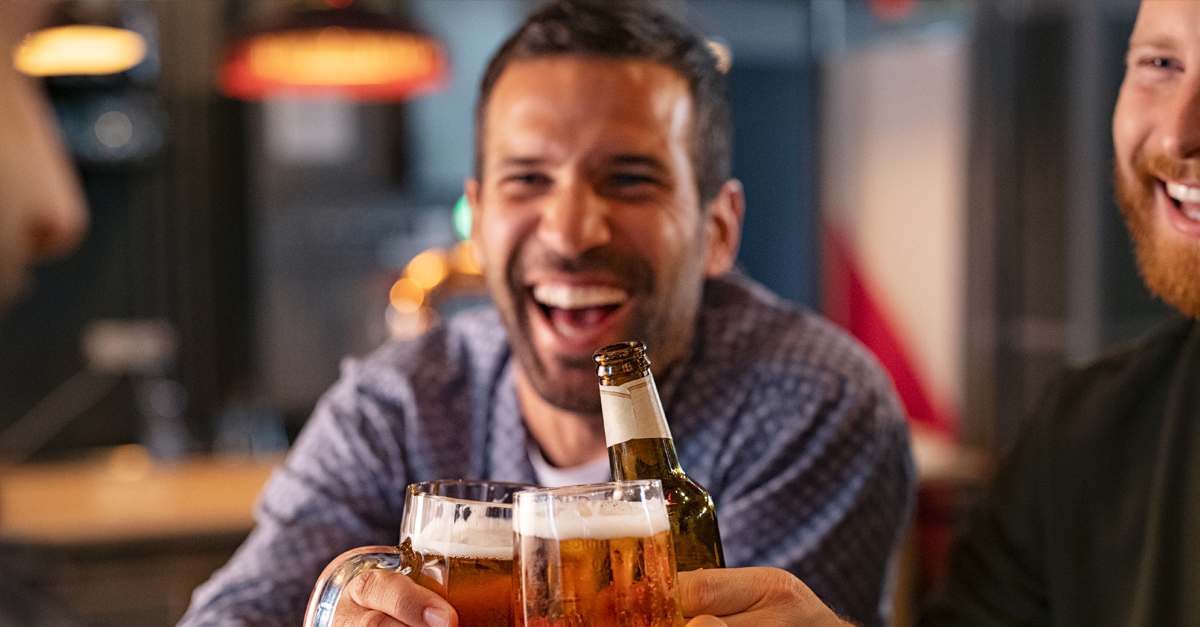 Fathers celebrating Father's Day with a beer